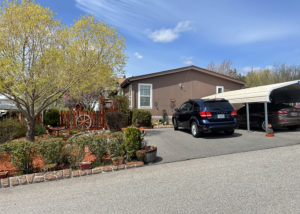 Mobile home with covered parking